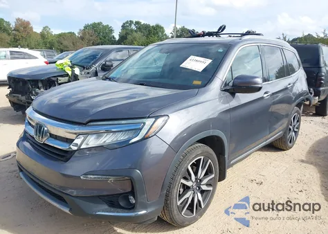 2020 Honda Pilot Awd Touring 7 Passenger z USA, uszkodzony, nr VIN 5FNYF6H67LB034908